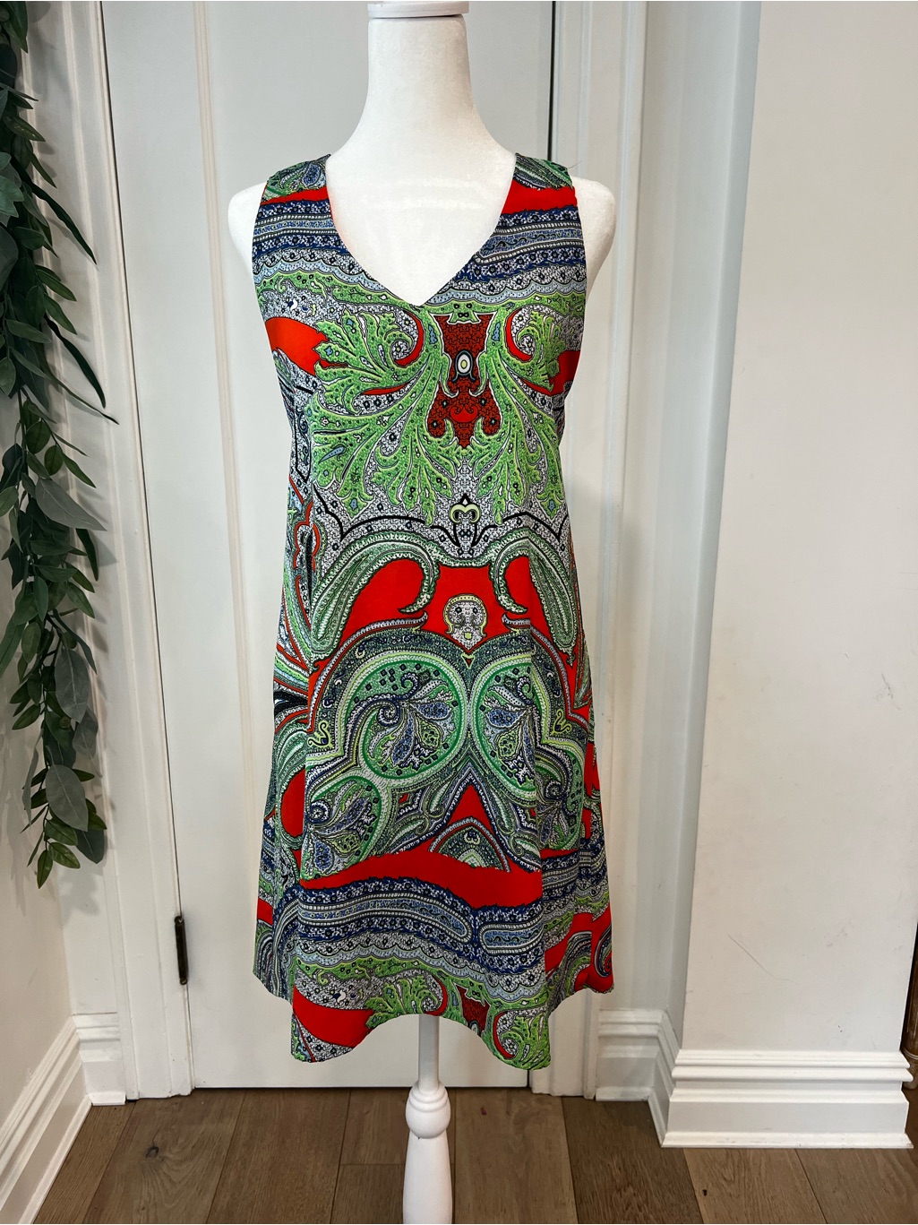 Tyche Sleeveless V-Neck Midi Dress In Red & Green Paisley